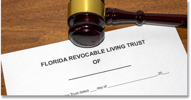 Physical copy of a Florida Revocable Living Trust with a judges gavel above it symbolizing trust litigation